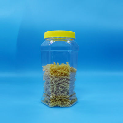 হেক্সাগোনাল আকৃতির ফুড গ্রেড কুকি মিষ্টি ফুড ক্লিয়ার পিইটি জার হলুদ ফ্ল্যাট ক্যাপ