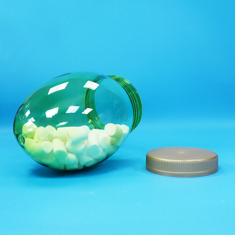 অনন্য আকৃতি স্বচ্ছ প্লাস্টিকের পিইটি খাদ্য গ্রেড বাদাম পিস্তল ক্যান্ডি জার স্ক্রু ফ্ল্যাট ঢাকনা