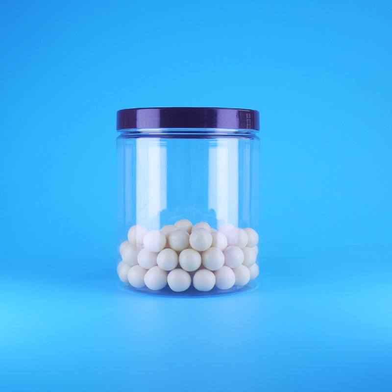 খাদ্য গ্রেড এয়ারটাইট লম্বা গোলাকার স্বচ্ছ PET প্লাস্টিক মিষ্টি শুকনো খাবারের জার স্ক্রু ফ্ল্যাট ঢাকনা