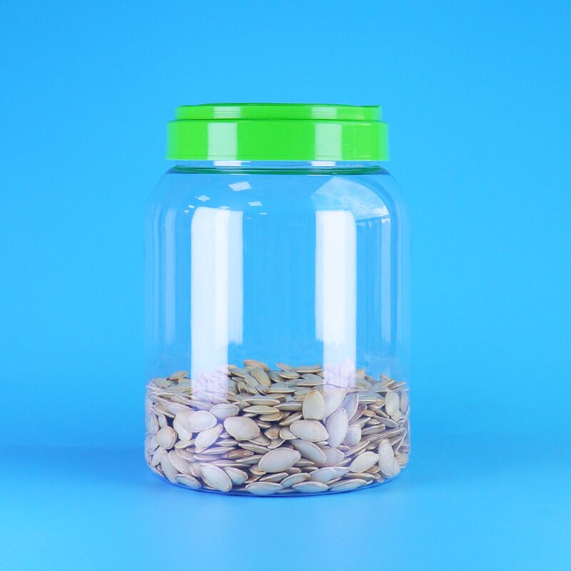 খাদ্য গ্রেড ফ্ল্যাট ক্যাপ ক্লিয়ার কফি ক্যান্ডি পদ্ম বীজ বেবি ফুড পিইটি রাউন্ড প্লাস্টিক জার